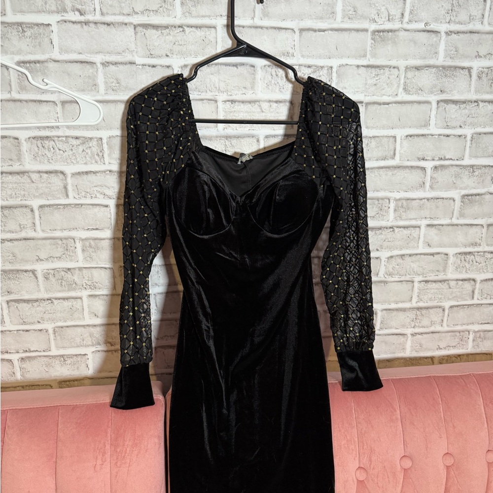 Elegant Black Dress with Embellished Sleeves